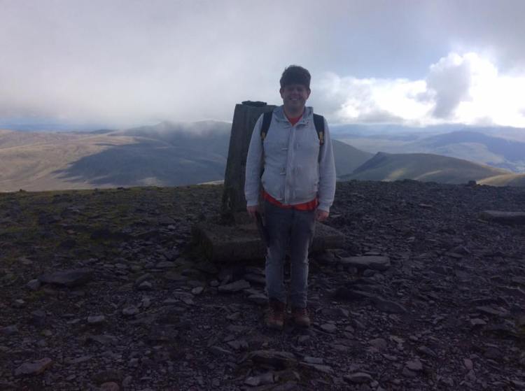 Me on top of Skiddaw... right photo taken, lets find someplace to eat!